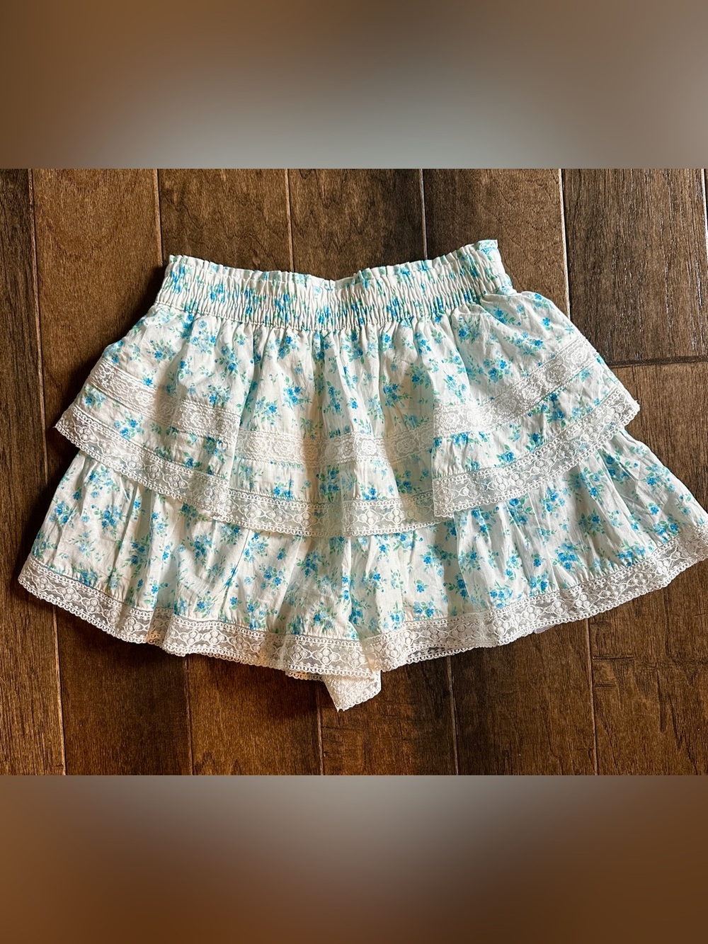 Altar'd State White Tiered Mini Skirt with Blue Floral Print